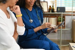 a doctor meeting with a patient to review test results